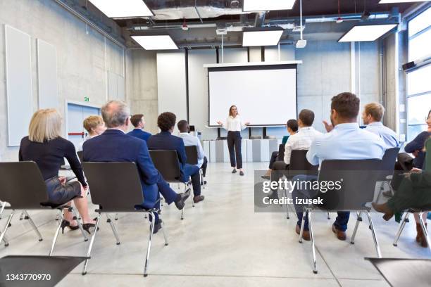 business conference in the convention center - seminar stock pictures, royalty-free photos & images