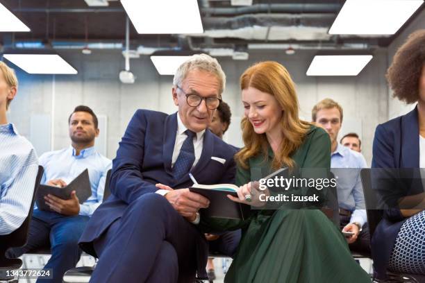 business people during seminar - western europe stock pictures, royalty-free photos & images