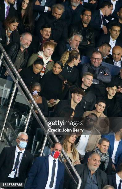 Minister for Sports Roxana Maracineanu, President of French League LFP Vincent Labrune, below Ed Sheeran between his father John Sheeran and his wife...