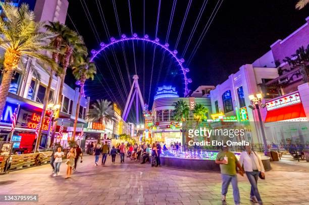 the high roller ferris wheel at the linq hotel and casino at night - las vegas, nevada, usa - las vegas stock pictures, royalty-free photos & images