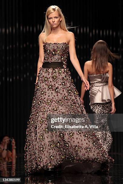 Model walks the runway during Tony Ward fashion show as part of AltaRoma AltaModa Autumn/Winter 2010 on July 12, 2010 in Rome, Italy.