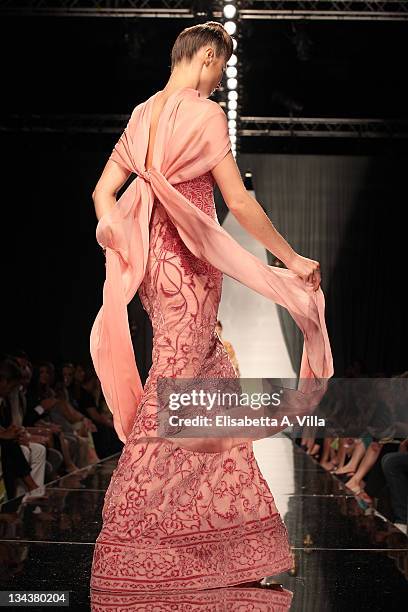 Model walks the runway during Rami Al Ali fashion show as part of AltaRoma AltaModa Autumn/Winter 2010 on July 12, 2010 in Rome, Italy.