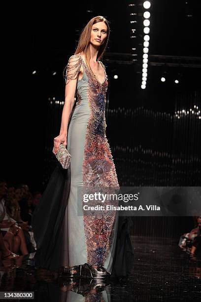 Model walks the runway during Tony Ward fashion show as part of AltaRoma AltaModa Autumn/Winter 2010 on July 12, 2010 in Rome, Italy.