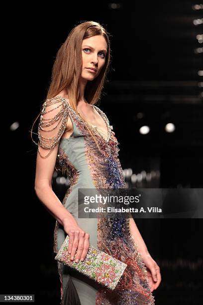 Model walks the runway during the Tony Ward fashion show as part of AltaRoma AltaModa Autumn/Winter 2010 on July 12, 2010 in Rome, Italy.