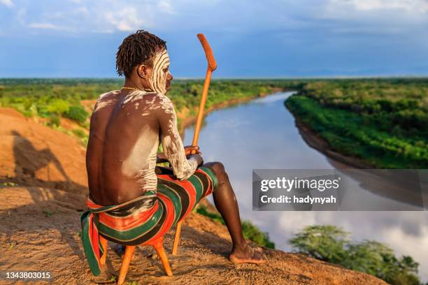 young african man from karo tribe, east africa - african tribal face painting 個照片及圖片檔