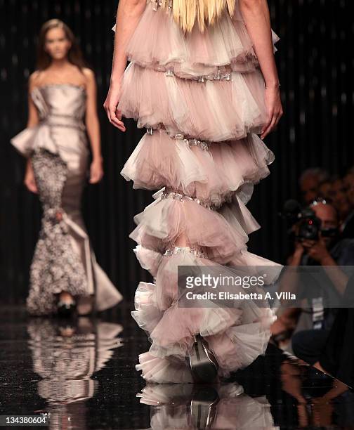 Model walks the runway during the Tony Ward fashion show as part of AltaRoma AltaModa Autumn/Winter 2010 on July 12, 2010 in Rome, Italy.