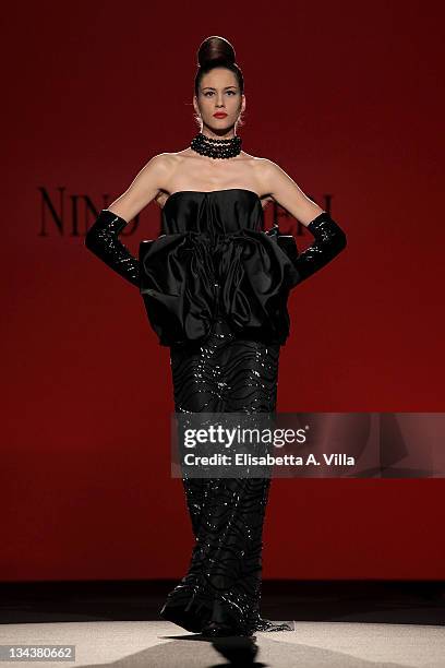 Model walks the runway during Nino Lettieri fashion show as part of AltaRoma AltaModa Autumn/Winter 2010 on July 12, 2010 in Rome, Italy.