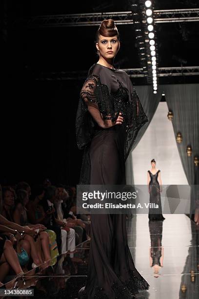 Model walks the runway during Rami Al Ali fashion show as part of AltaRoma AltaModa Autumn/Winter 2010 on July 12, 2010 in Rome, Italy.