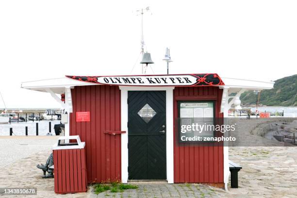 red wooden harbor building in molle, sweden - on location for person of interest stock pictures, royalty-free photos & images