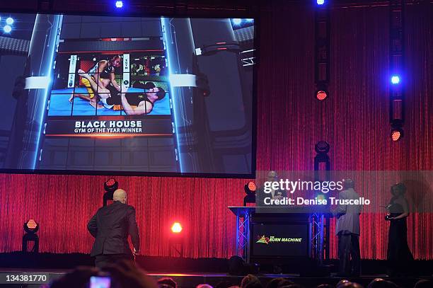 Tito Ortiz and Burt Watson present the Gym of the Year Award at the 2011 Fighters Only World Mixed Martial Arts Awards at the Palms Casino Resort on...