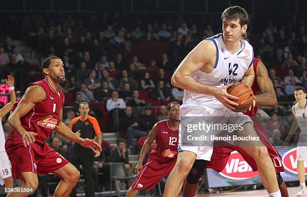 Stanko Barac, #42 of Anadolu Efes in action during the 2011-2012 Turkish Airlines Euroleague Regular Season Game Day 7 between Belgacom Spirou v...