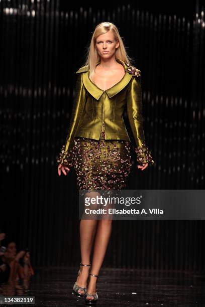 Model walks the runway during Tony Ward fashion show as part of AltaRoma AltaModa Autumn/Winter 2010 on July 12, 2010 in Rome, Italy.