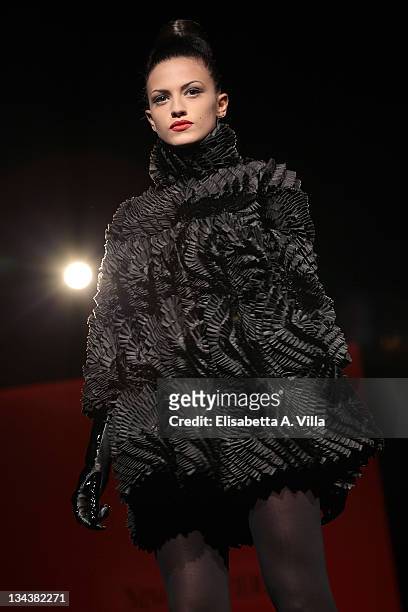 Model walks the runway during Nino Lettieri fashion show as part of AltaRoma AltaModa Autumn/Winter 2010 on July 12, 2010 in Rome, Italy.