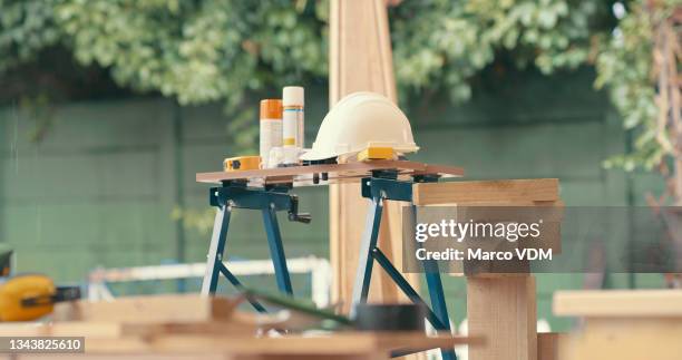 of woodworking supplies in the backyard at home - trestles stockfoto's en -beelden