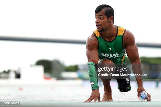 Giovane Vieira de Paula of Team Brazil gets out of the water celebrating his silver medal after he competes in the Canoe Sprint Men's Va'a Single...