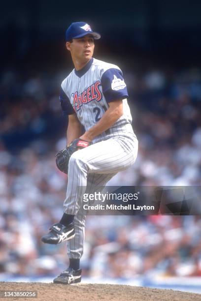 Shigetoshi Hasegawa of the Anaheim Angels pitches during a baseball game against the New York Yankees on July 23, 1997 at Yankee Stadium in New York...