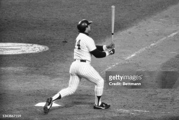 Yankees' Reggie Jackson hits his third home run of the game against the Dodgers. The Yankees won 8-4 in the 6th game of the World Series.
