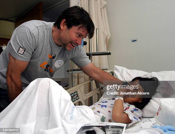 Peter Reckell and patient during Toyota Grand Prix Pro/Celebs Visit Children's Hospital at Miller's Children Hospital in Long Beach, California,...