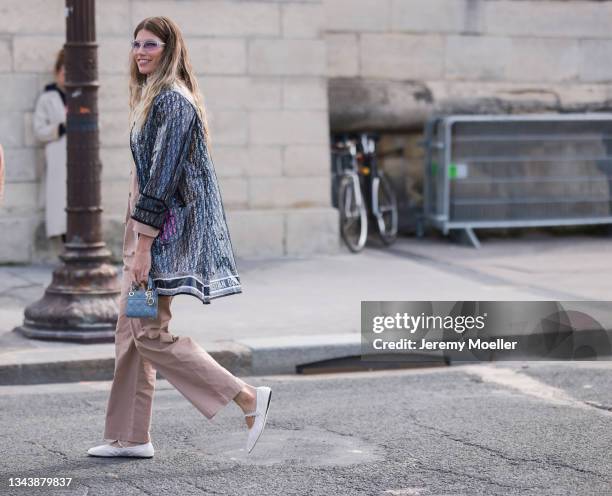 Veronika Heilbrunner wearing Full Dior Look outside Dior on September 28, 2021 in Paris, France.