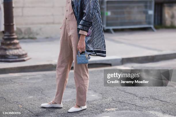 Veronika Heilbrunner wearing Full Dior Look outside Dior on September 28, 2021 in Paris, France.