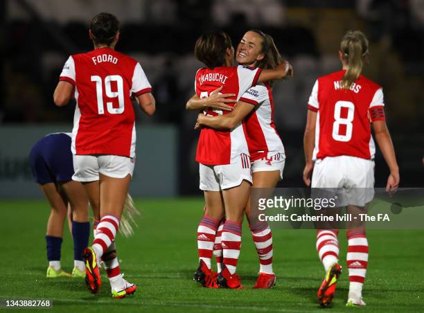 Mana Iwabuchi of Arsenal celebrates with Lia Waelti after scoring their side's first goal during the Vitality Women's FA Cup Quarter Final match...