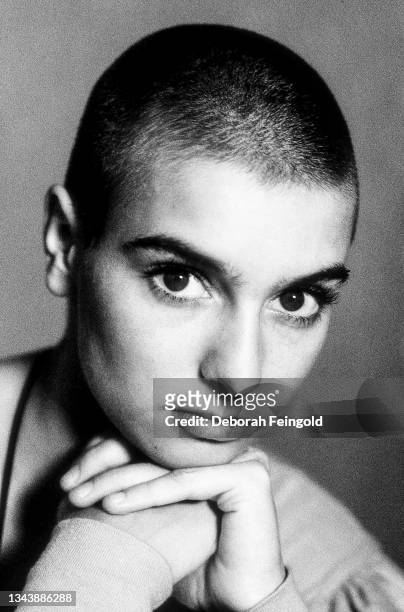 Deborah Feingold/Corbis via Getty Images) Close-up of Irish musician Sinead O'Connor, Canada, 1990.