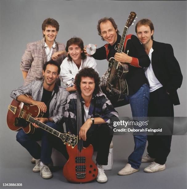 Deborah Feingold/Corbis via Getty Images) Portrait of the members of British Rock group Dire Straits, New York, New York, 1985. Pictured are, from...