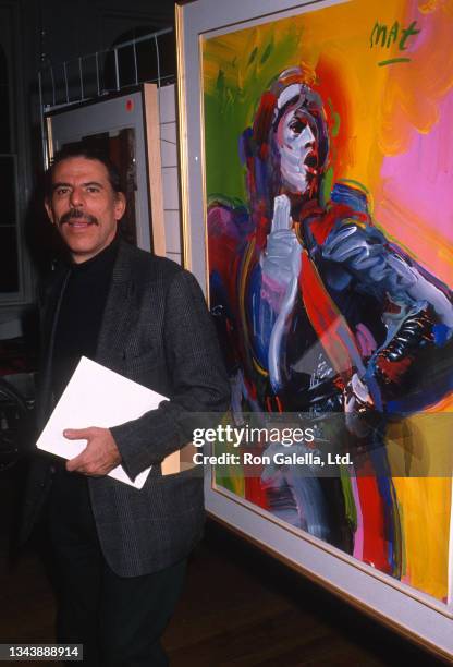 German-born American Pop artist Peter Max attends an Echo Lake Idea celebrity art auction at the Puck Building, New York, New York, November 15, 1989.