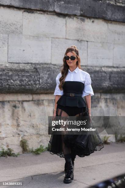 Negin Mirsalehi wearing a dior look outside Dior on September 28, 2021 in Paris, France.