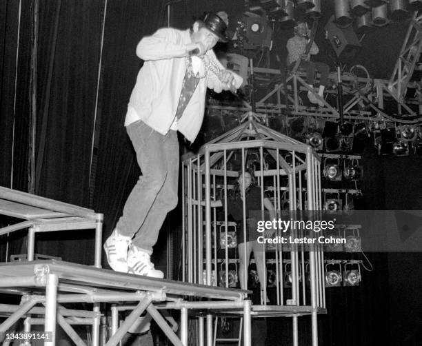American rapper Michael Diamond, aka Mike D, of the American hip hop group The Beastie Boys, sings on stage during a concert circa June, 1987 at the...