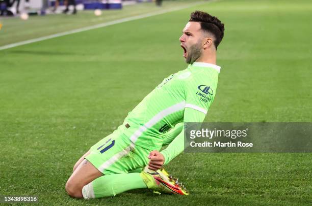 Renato Steffen of VfL Wolfsburg celebrates scoring his sides opening goal during the UEFA Champions League group G match between VfL Wolfsburg and...