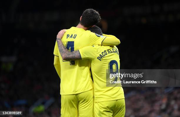 Paco Alcacer of Villarreal CF celebrates with Pau Torres after scoring their side's first goal during the UEFA Champions League group F match between...