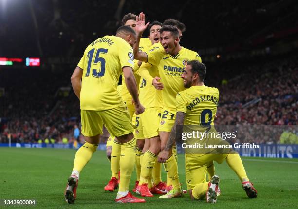 Paco Alcacer of Villarreal CF celebrates with Yeremi Pino and Arnaut Danjuma after scoring their side's first goal during the UEFA Champions League...
