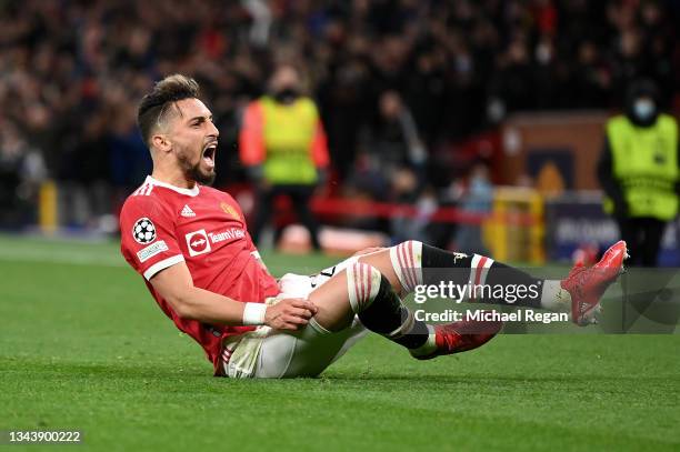 Alex Telles of Manchester United celebrates after scoring their side's first goal during the UEFA Champions League group F match between Manchester...