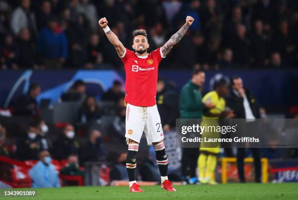 Alex Telles of Manchester United celebrates after scoring their side's first goal during the UEFA Champions League group F match between Manchester...