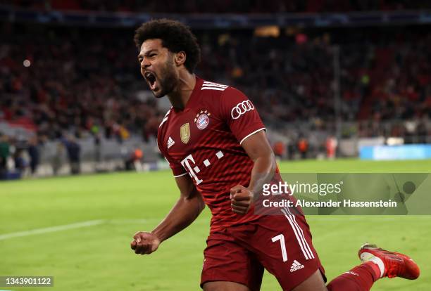 Serge Gnabry of FC Bayern Muenchen celebrates after scoring their side's third goal during the UEFA Champions League group E match between FC Bayern...