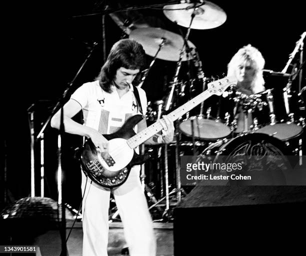 English bassist John Deacon and English bassist John Deacon, English musician, singer-songwriter and multi-instrumentalist Roger Taylor, of the...