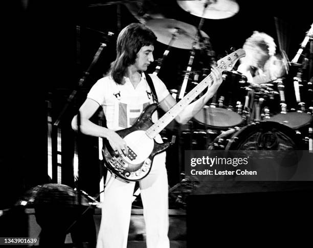 English bassist John Deacon and English bassist John Deacon, English musician, singer-songwriter and multi-instrumentalist Roger Taylor, of the...