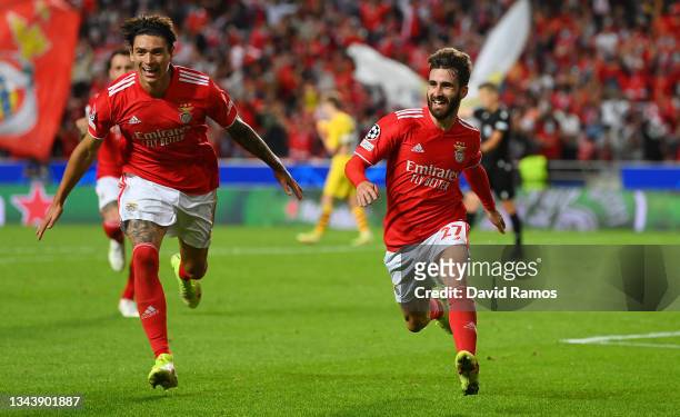 Rafa of SL Benfica celebrates scoring his sides second goal with Darwin Nunez during the UEFA Champions League group E match between SL Benfica and...