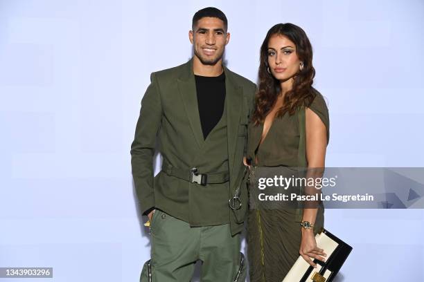 Achraf Hakimi and Hiba Abouk attend the Balmain Festival as part of Paris Fashion Week Womenswear Spring/Summer 2022 at La Seine Musicale on...