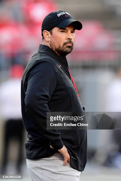 Ohio State Buckeyes head coach Ryan Day directs warmups before a game between the Akron Zips and Ohio State Buckeyes at Ohio Stadium on September 25,...
