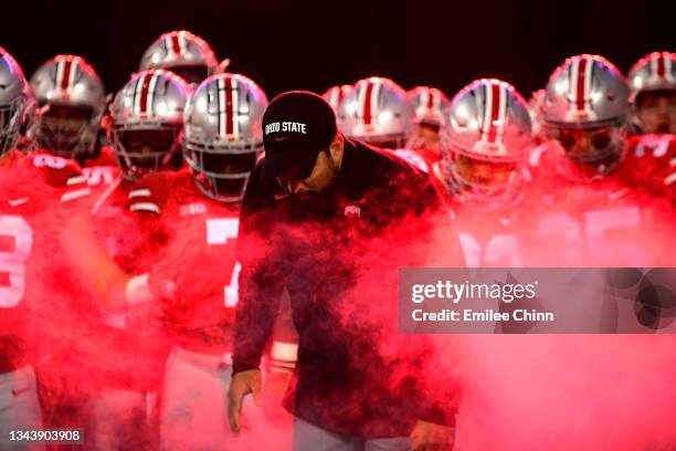 Ohio State Buckeyes head coach Ryan Day leads his team onto the field prior to a game against the Akron Zips at Ohio Stadium on September 25, 2021 in...