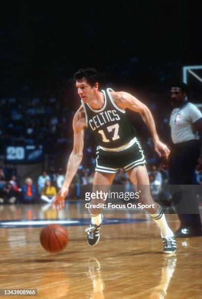 John Havlicek of the Boston Celtics dribbles the ball against the Washington Bullets during an NBA basketball game circa 1977 at the Capital Centre...