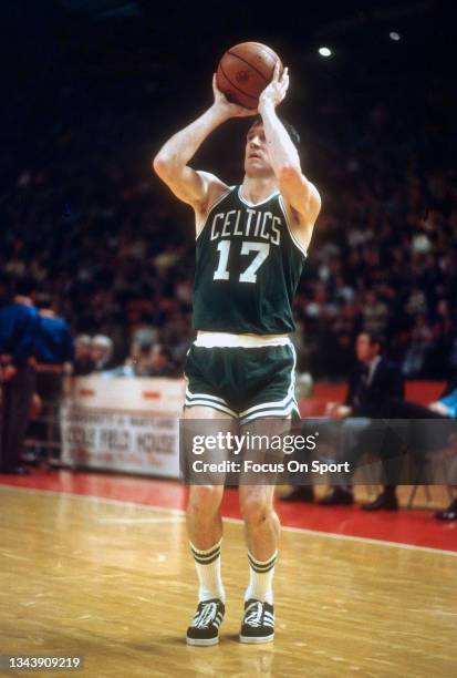 John Havlicek of the Boston Celtics shoots against the Washington Bullets during an NBA basketball game circa 1975 at the Capital Centre in Landover,...