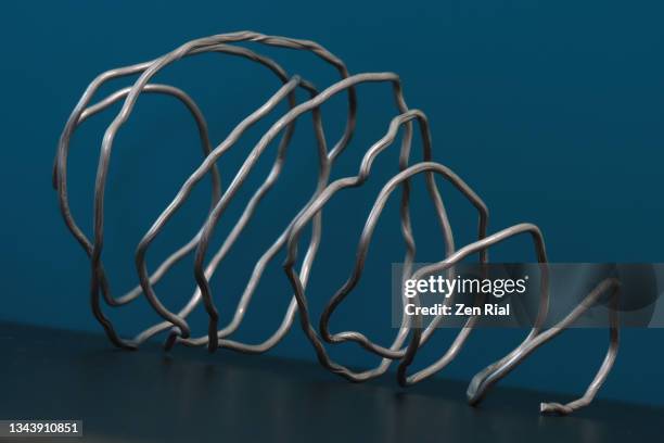 Coiling Shape 623 Coil Shaped Stock Photos, High-Res Pictures, and Images - Getty Images