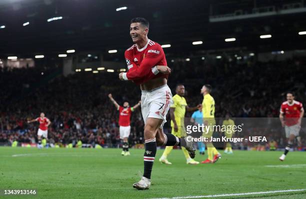 Cristiano Ronaldo of Manchester United celebrates after scoring their side's second goal during the UEFA Champions League group F match between...
