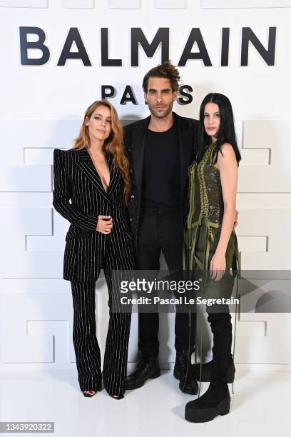 Alejandra Onieva, Jon Kortajarena and Milena Smit attend the Balmain Festival as part of Paris Fashion Week Womenswear Spring/Summer 2022 at La Seine...