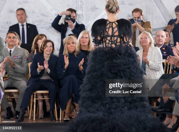 French Defence Minister Florence Parly, French First Lady Brigitte Macron and State Secretary for Persons with Disabilities Sophie Cluzel applaud as...