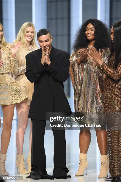 Designer Olivier Rousteing and models walk the runway during the Balmain Festival V02 Womenswear Spring/Summer 2022 show as part of Paris Fashion...