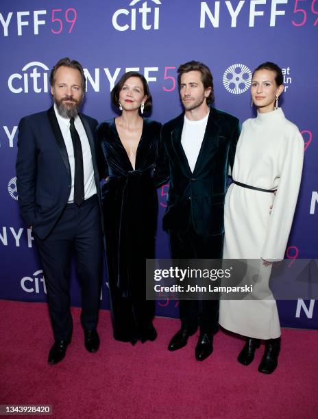 Peter Sarsgaard, Maggie Gyllenhaal, Jake Gyllenhaal and Jeanne Cadieu attend the premiere of "The Lost Daughter" during the 59th New York Film...